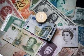 في حال أطلقت روسيا والصين وإيران عملات رقمية فما هو مصير الدولار؟